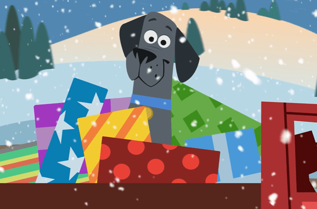 Jac the black lab mascot with presents