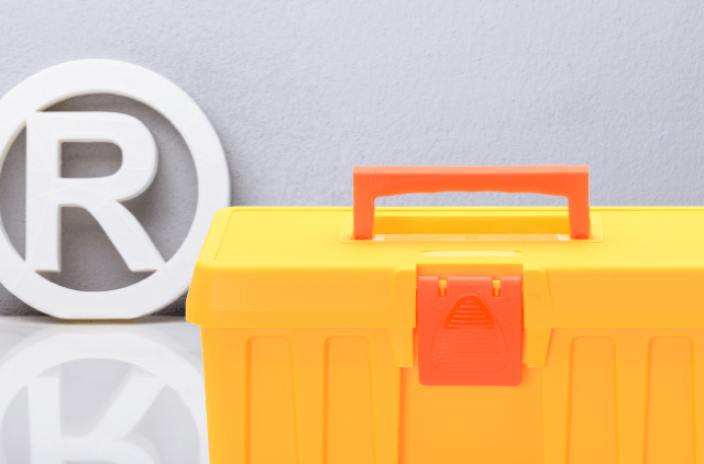 toolbox with trademark symbol in background